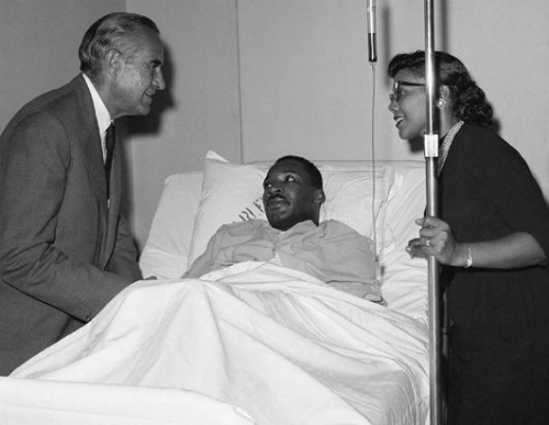 MLK in hospital after he was stabbed at a book signing. Coretta Scott King is on the right